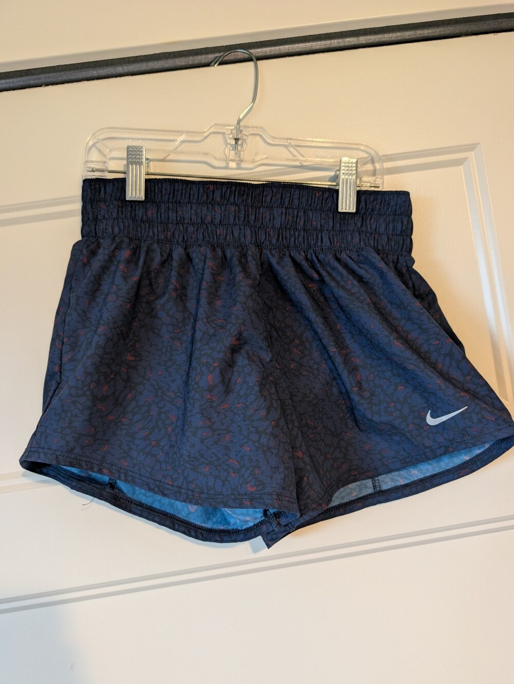 Nike Women's Dark Navy Athletic Shorts with Small Red Print